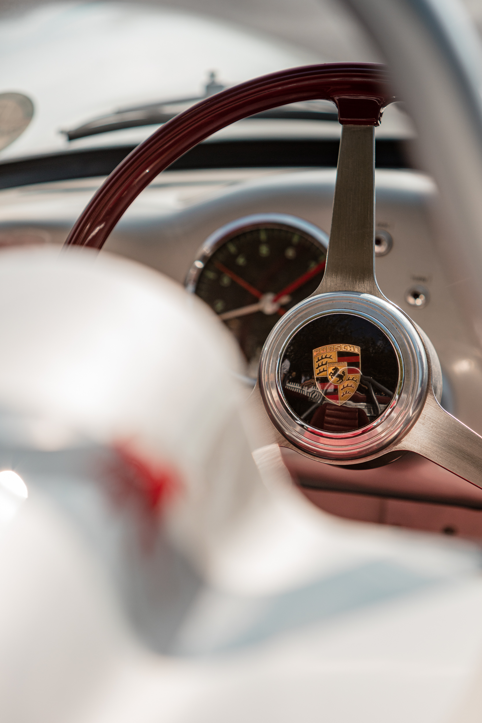classic porsche driven by derek bell at goodwood revival with mack logistics